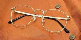Golden frame spectacles